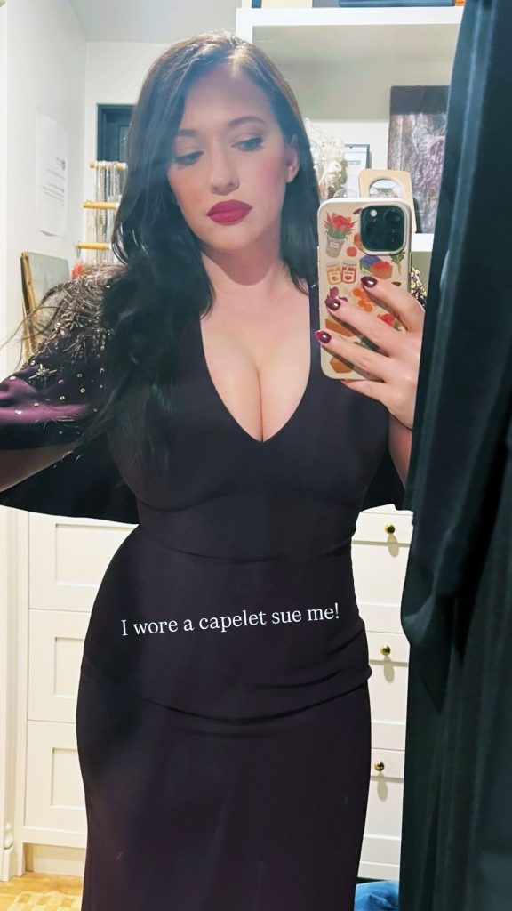 Frontal selfie of Kat Dennings