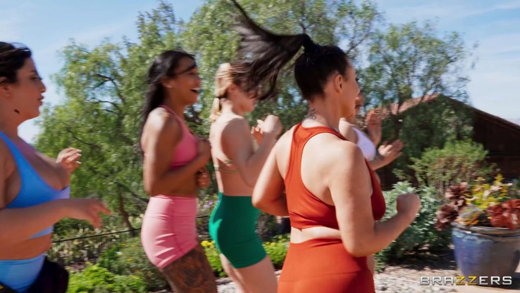 Side view of a group of women out for a run together