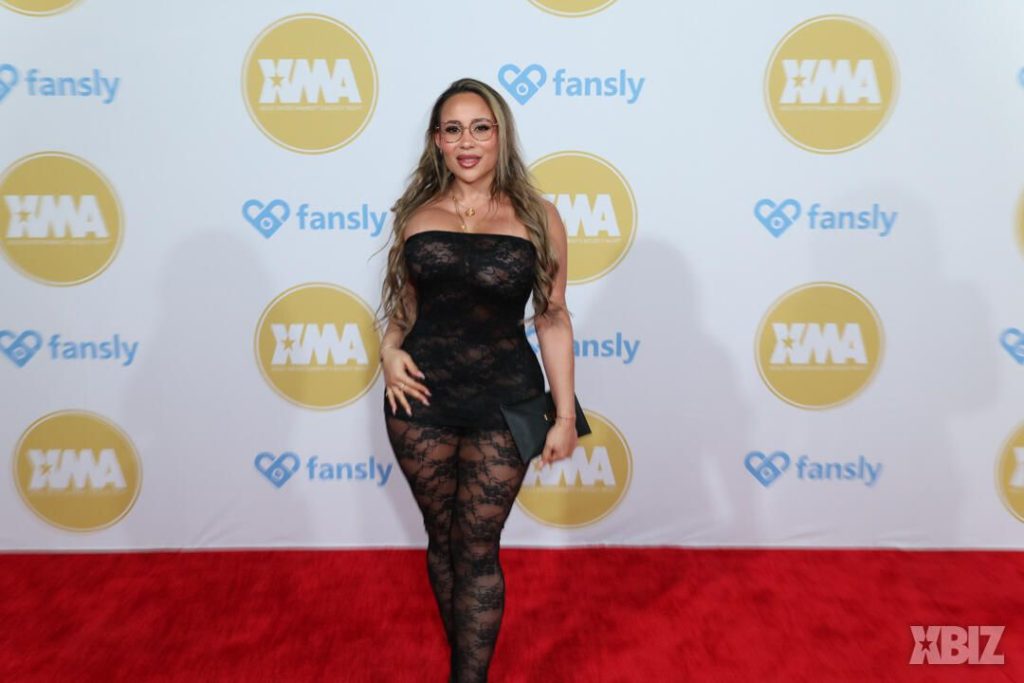 Frontal of porn star in sexy dress on the red carpet