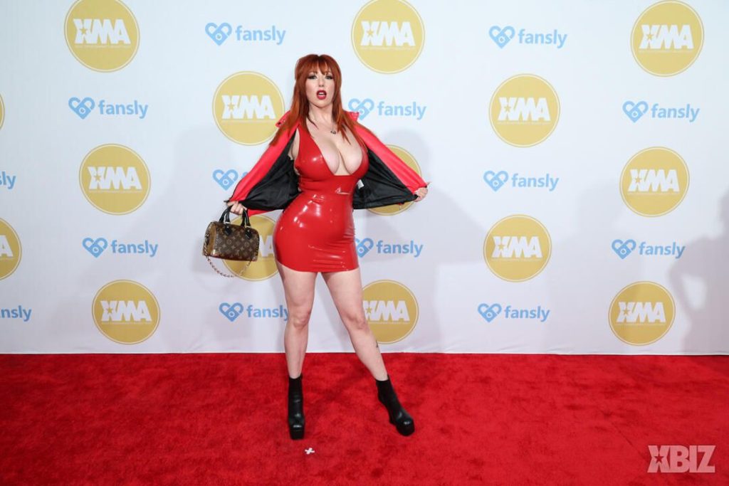 Frontal of porn star in sexy dress on the red carpet