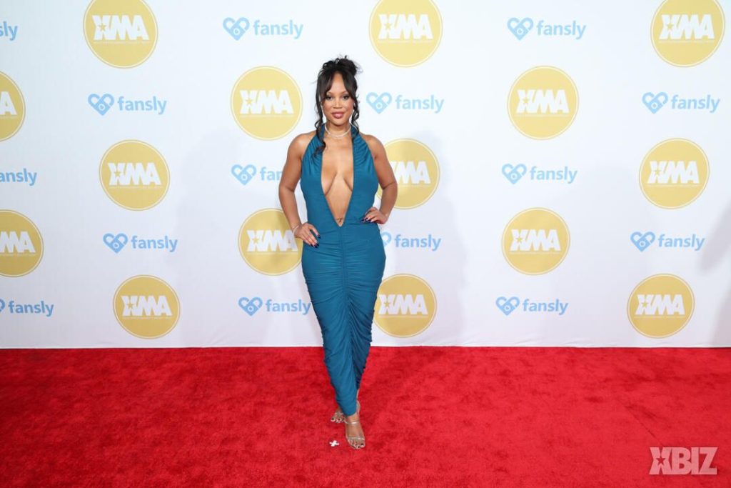 Frontal of porn star in sexy dress on the red carpet