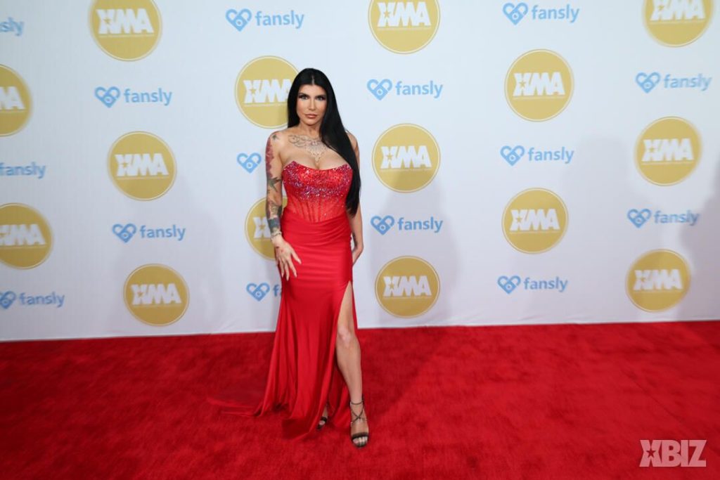 Frontal of porn star in sexy dress on the red carpet