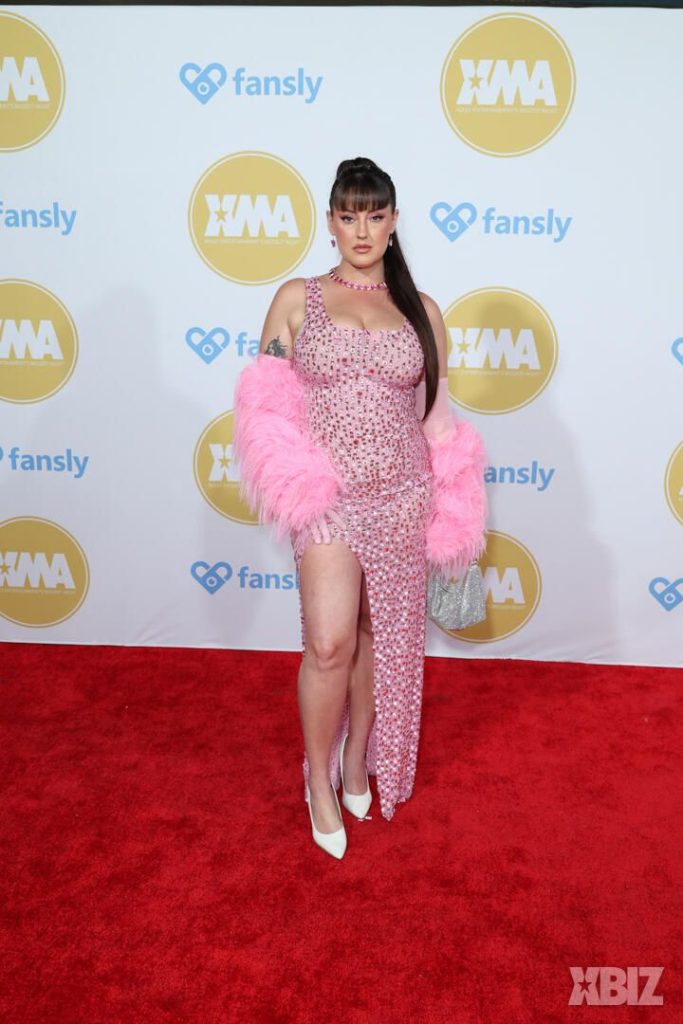 Frontal of porn star in sexy dress on the red carpet