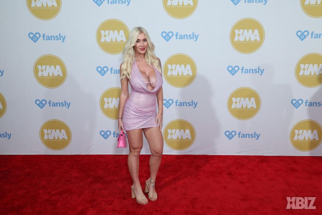 Frontal of porn star in sexy dress on the red carpet