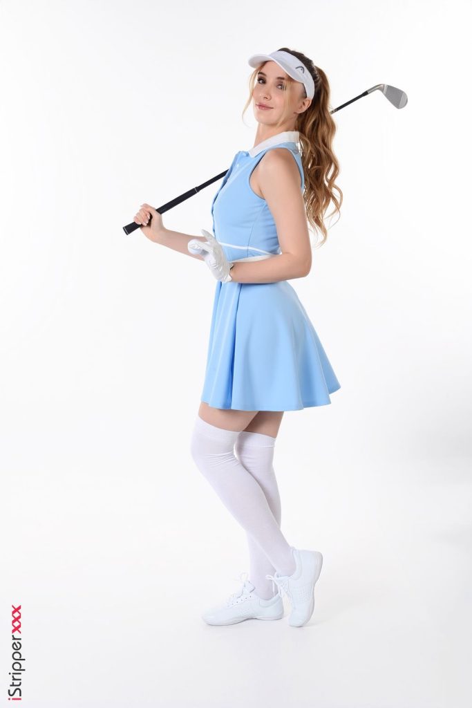 Full body side view of Golf girl holding a club on her shoulder