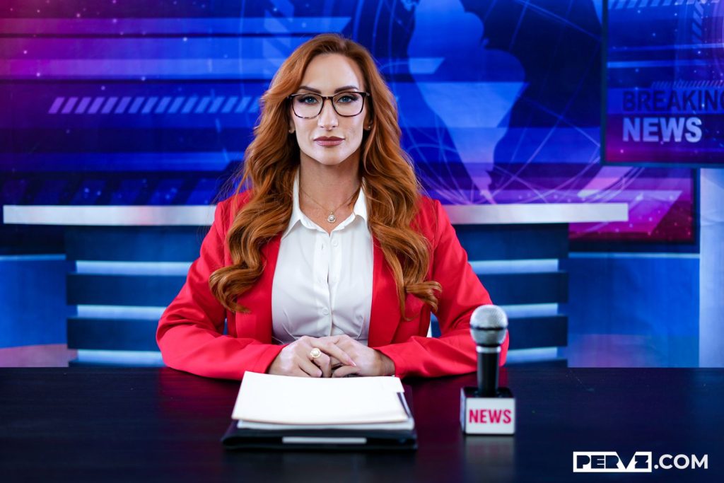 A woman with long red hair, glasses, and a red blazer sits at a news desk with a microphone labeled NEWS and documents in front of her. The background displays a digital world map and the words BREAKING NEWS.