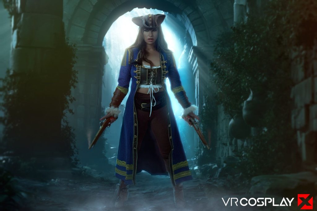 A woman in a blue pirate costume stands in a misty, ancient stone archway holding two pistols. Light streams in from behind, creating a dramatic effect.